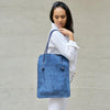 Sac Divine en cuir suede denim français avec anses en cordon interchangeables, sac évolutif personnalisable.
